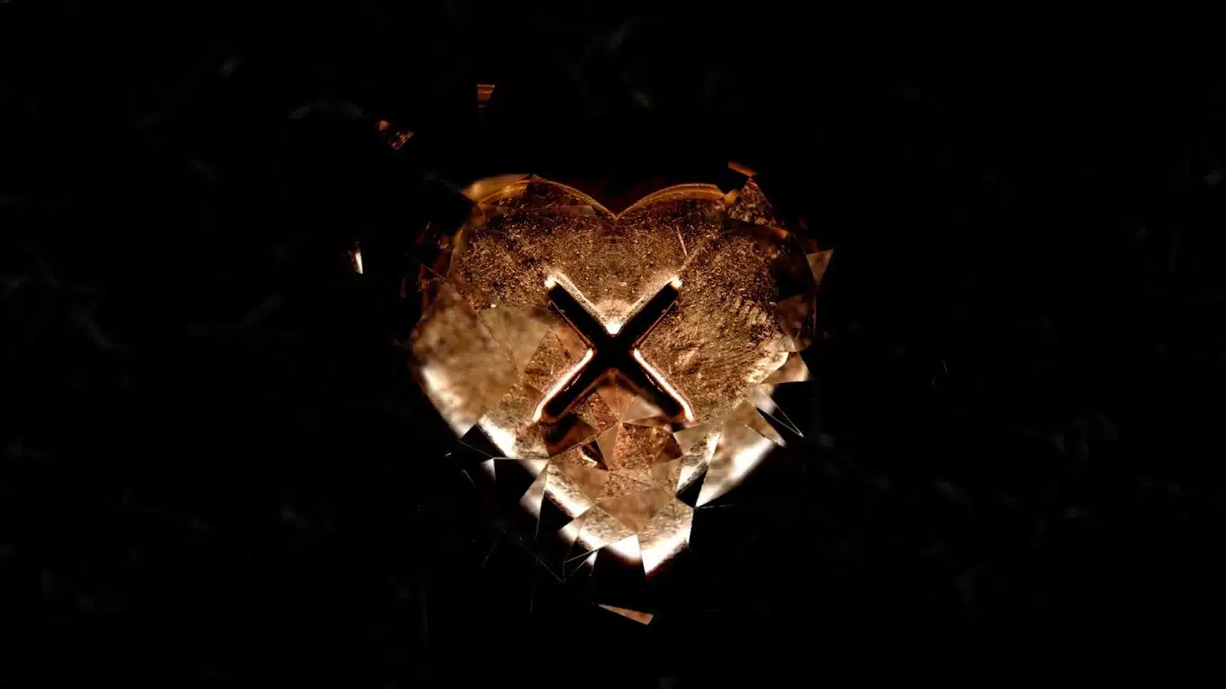 The Unloved heart logo, alternate. Bronze colour, shattered glass effect